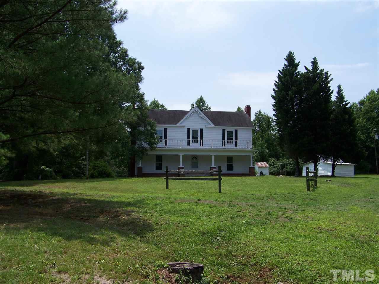 2114 Sanders Road Stem, NC 27581 - Photo 6 of 23 a house view with a play ground in front of it