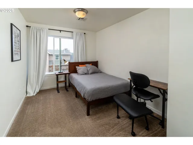 a room with furniture and a window