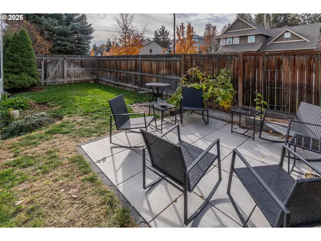 an aerial view of a house with a swimming pool