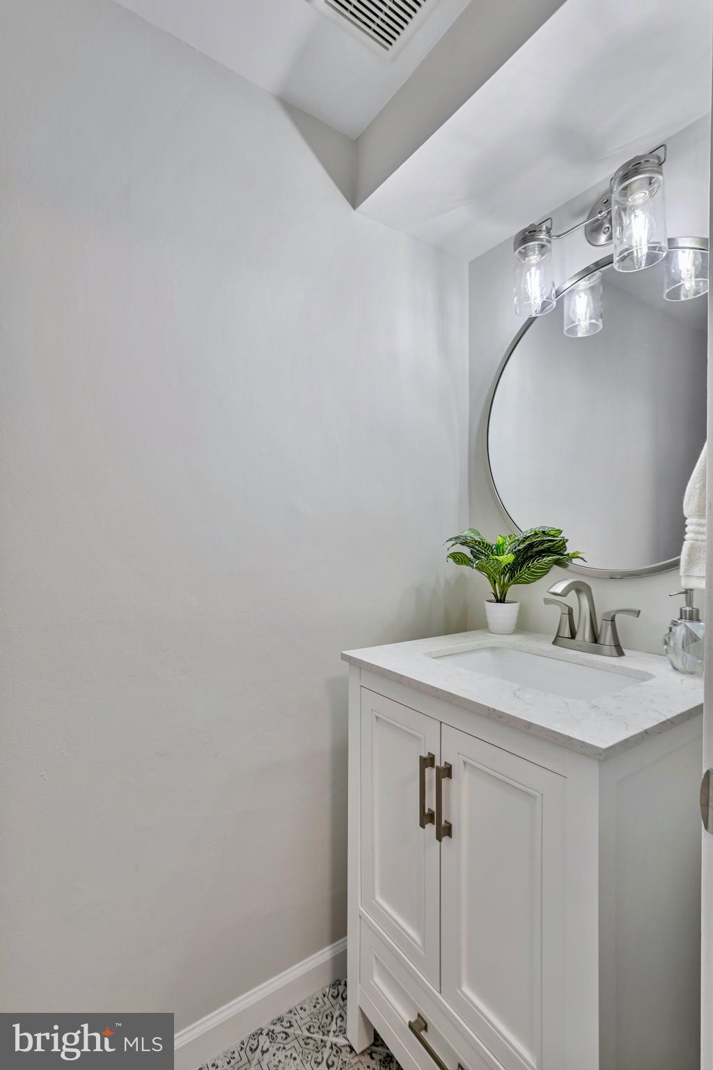 2257 Wheelwright Court Reston, VA 20191 - Photo 15 of 40 a bathroom with a sink and vanity