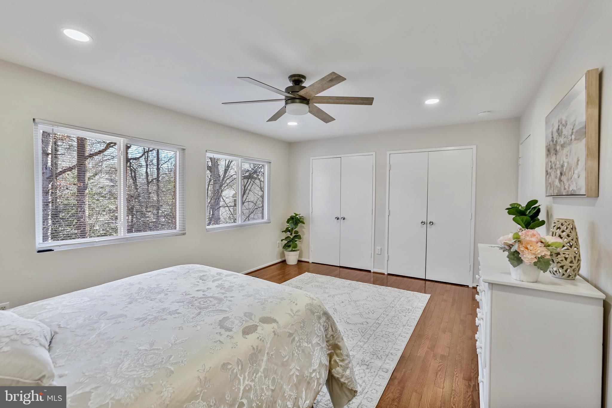 2257 Wheelwright Court Reston, VA 20191 - Photo 20 of 40 a bedroom with a bed and a window