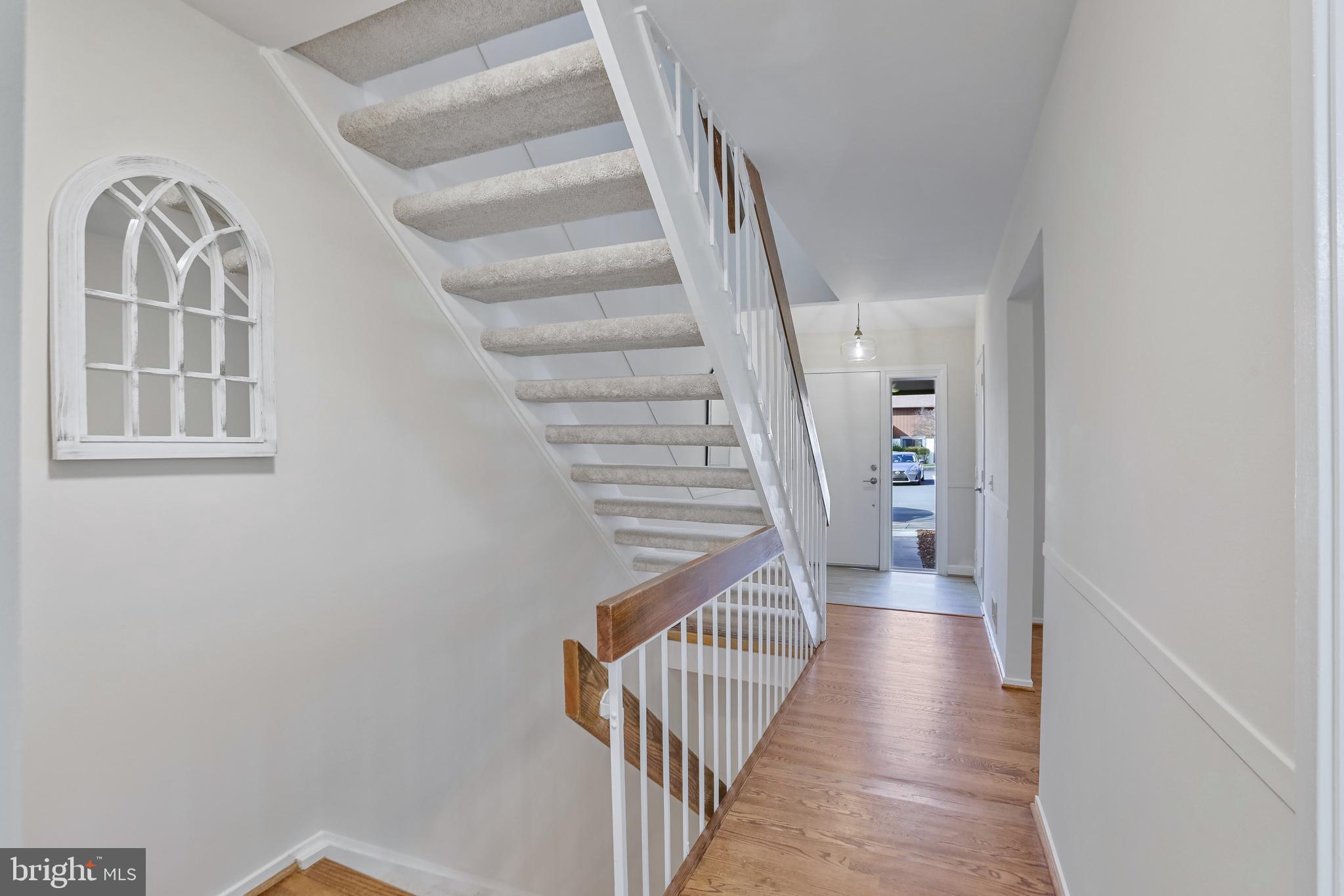 2257 Wheelwright Court Reston, VA 20191 - Photo 2 of 40 a view of a hallway view with staircase