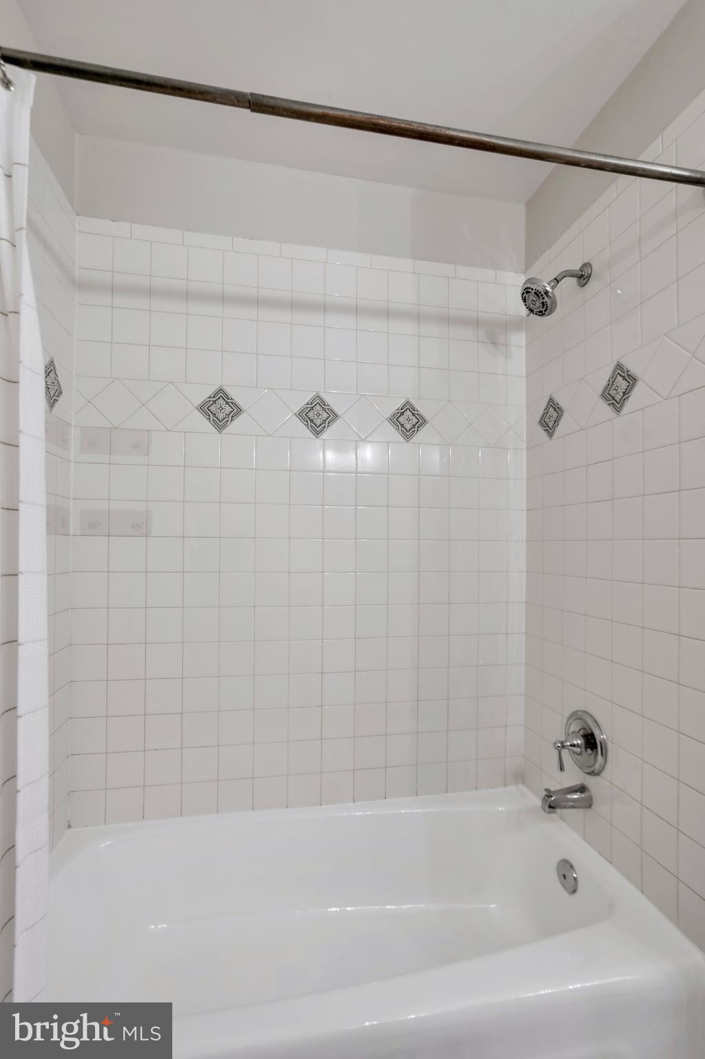2257 Wheelwright Court Reston, VA 20191 - Photo 23 of 40 a bathroom with a bathtub and a shower