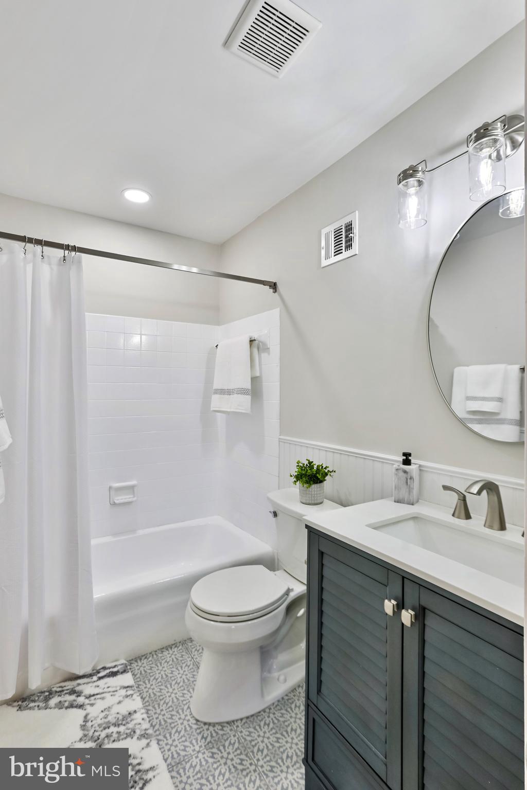 2257 Wheelwright Court Reston, VA 20191 - Photo 26 of 40 a bathroom with a sink a toilet and shower