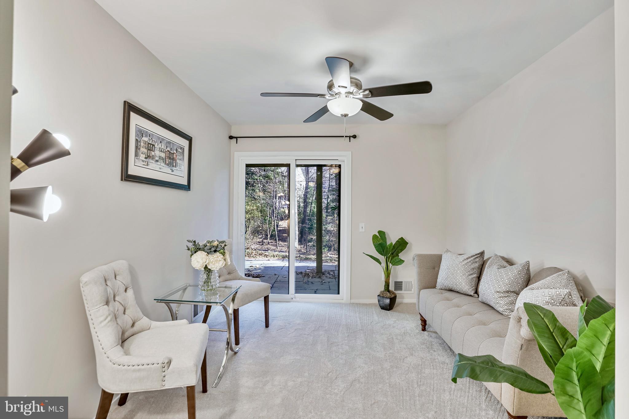 2257 Wheelwright Court Reston, VA 20191 - Photo 29 of 40 a living room with furniture and a potted plant