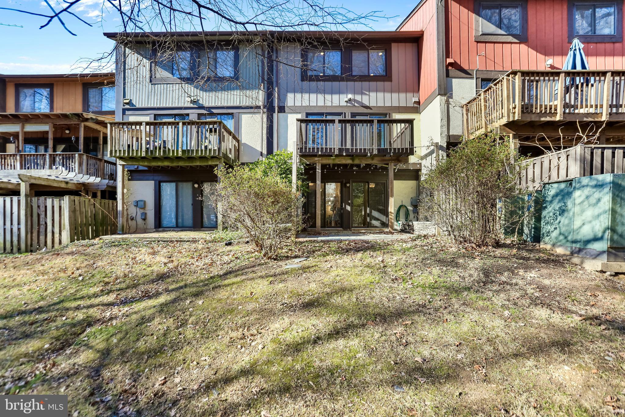 2257 Wheelwright Court Reston, VA 20191 - Photo 37 of 40 a view of a house with wooden fence