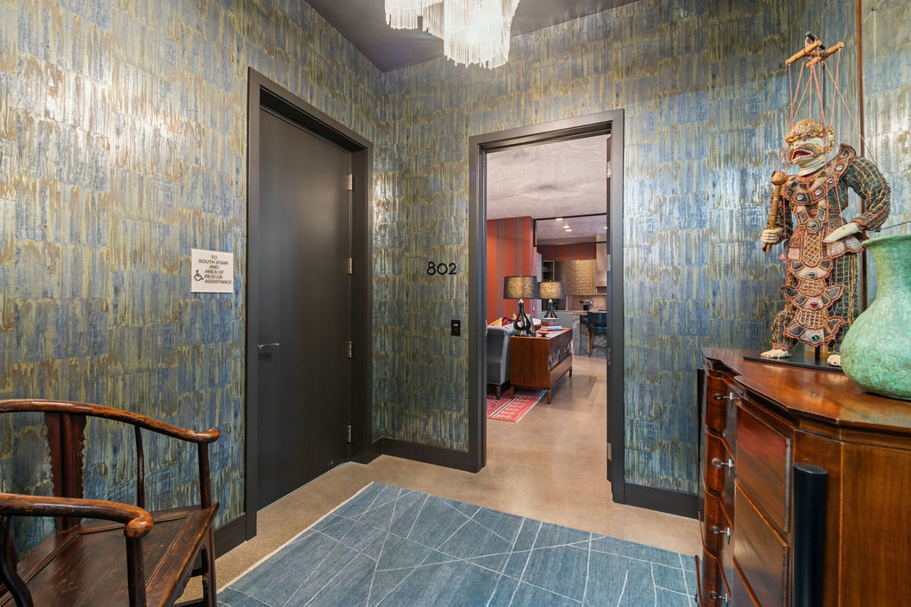 900 West Washington Boulevard, Unit 802 Chicago, IL 60607 - Photo 2 of 36 a view of hallway with livingroom and furniture