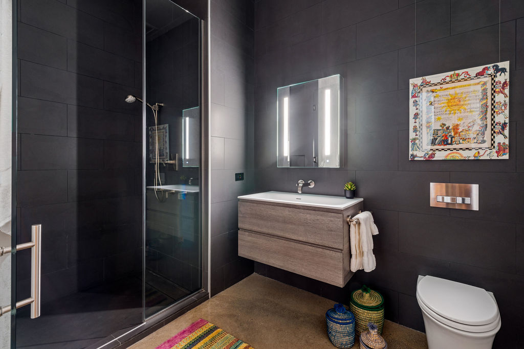 900 West Washington Boulevard, Unit 802 Chicago, IL 60607 - Photo 31 of 36 a bathroom with a sink toilet and shower