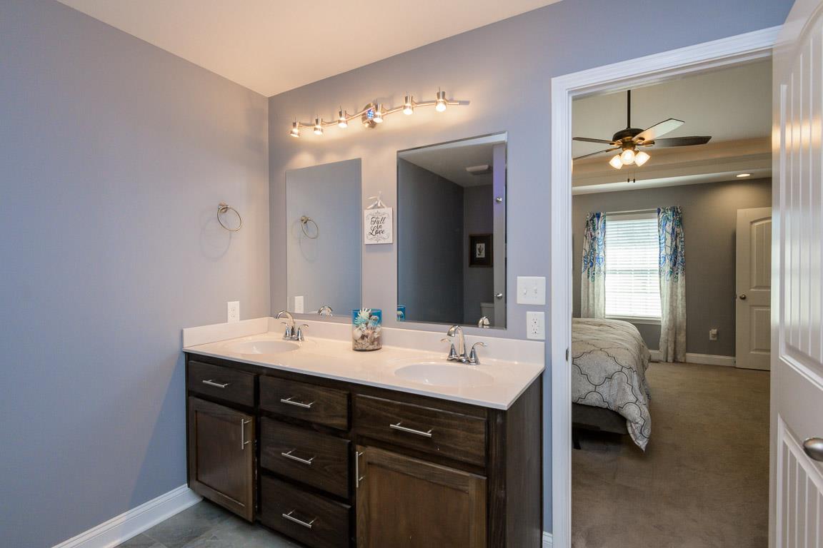 457 Goshen Road Lebanon, TN 37087 - Photo 19 of 30 a en suite bathroom with a double vanity sink and a mirror
