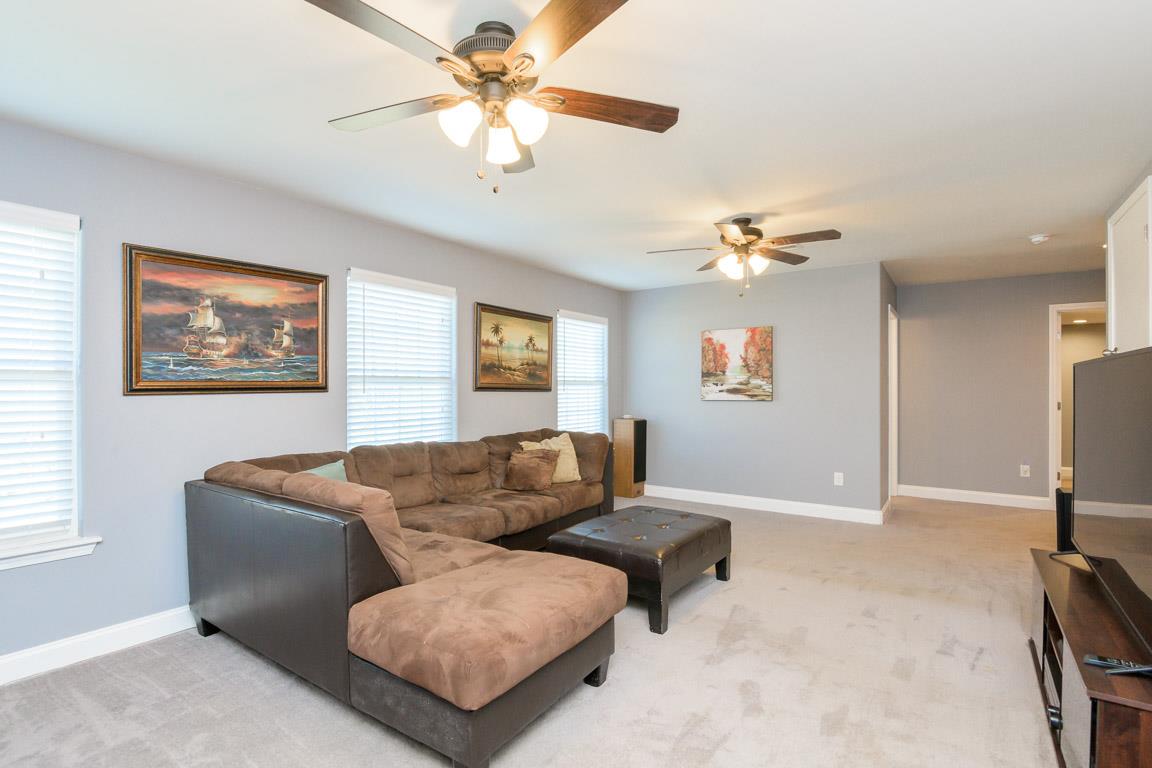 457 Goshen Road Lebanon, TN 37087 - Photo 22 of 30 a living room with furniture and a flat screen tv
