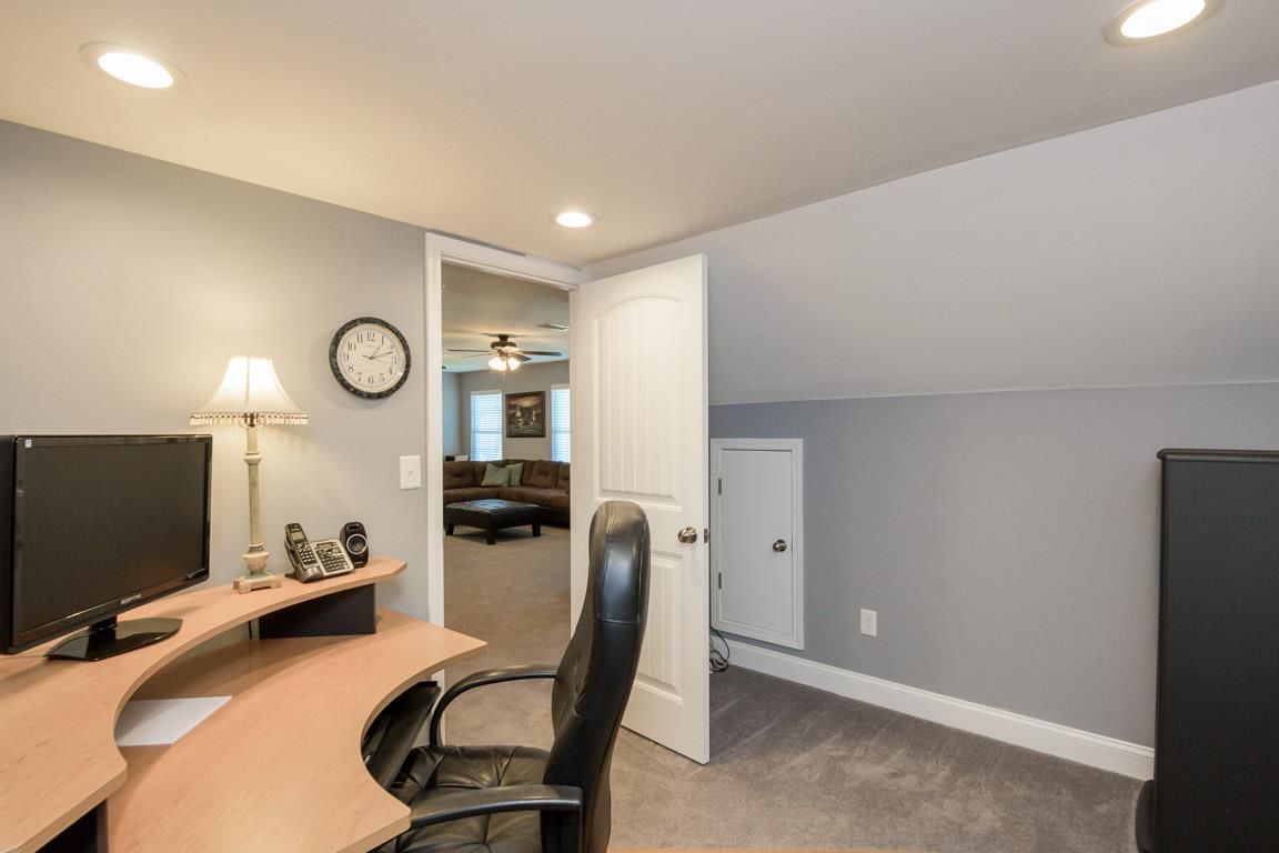 457 Goshen Road Lebanon, TN 37087 - Photo 23 of 30 a room with furniture and a flat screen tv