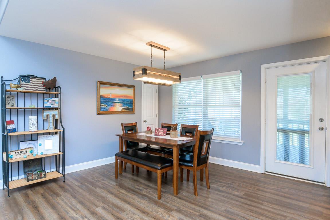 457 Goshen Road Lebanon, TN 37087 - Photo 6 of 30 a view of a dining room with furniture and wooden floor