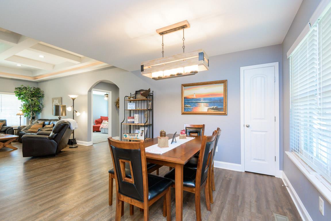 457 Goshen Road Lebanon, TN 37087 - Photo 7 of 30 a view of a dining room with furniture window and wooden floor