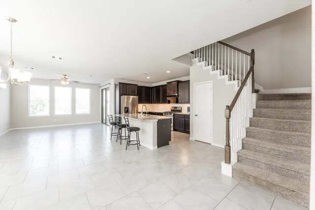 a view of kitchen with furniture and window
