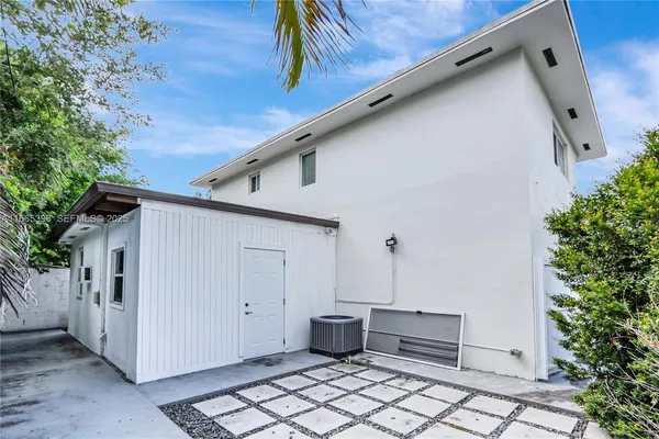 a view of a house with a furniture