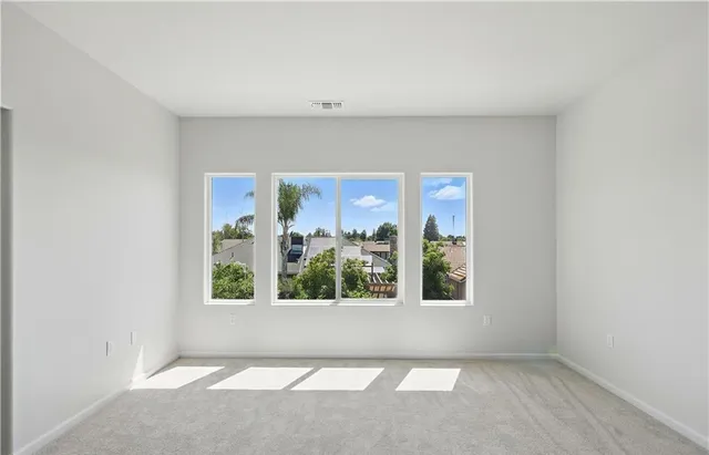 an empty room with windows