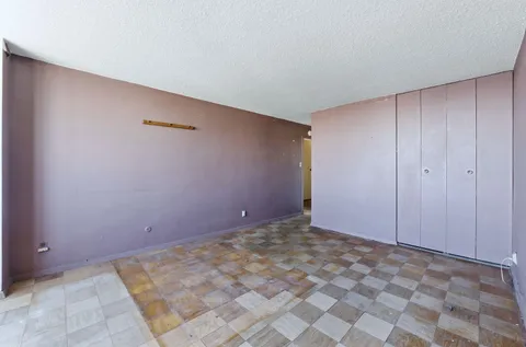 a kitchen with stainless steel appliances granite countertop a stove refrigerator and a sink