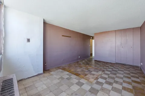 a kitchen with a stove and a microwave