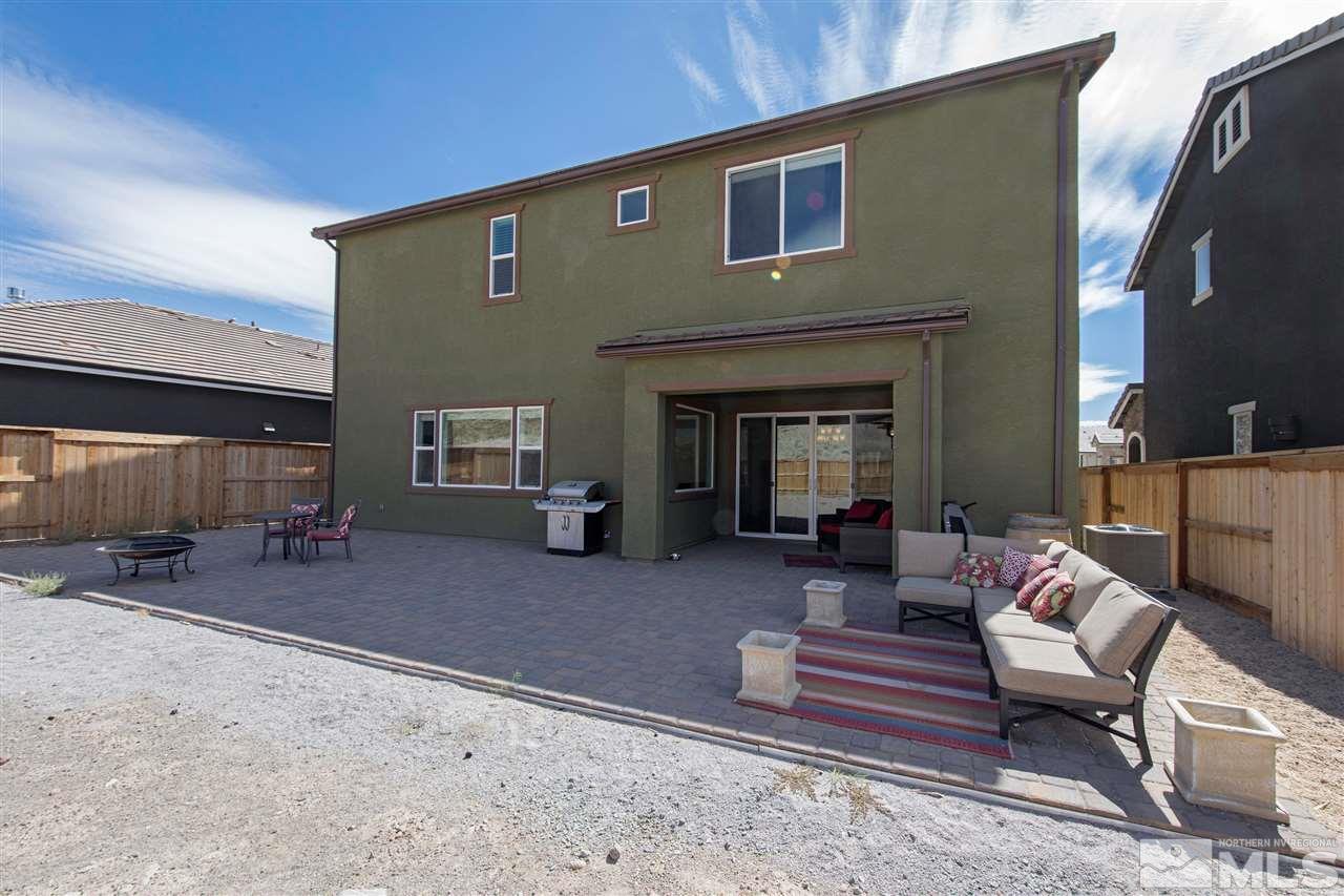 3115 Show Jumper Lane Reno, NV 89521 - Photo 22 of 25 a building outdoor space with patio furniture