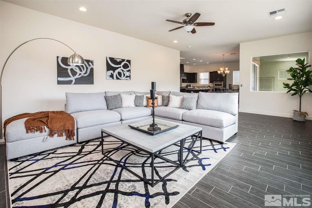 3115 Show Jumper Lane Reno, NV 89521 - Photo 4 of 25 a living room with furniture and wooden floor