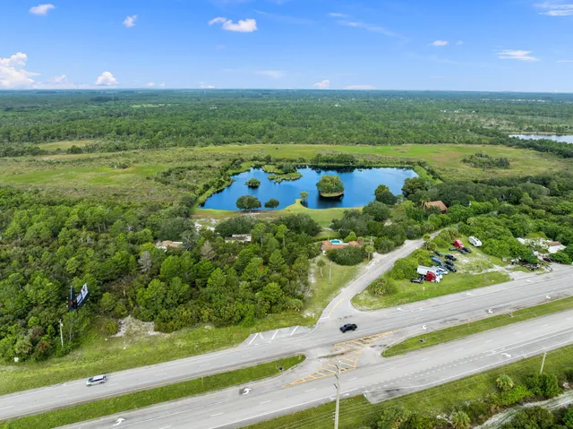 a view of a lake with a yard