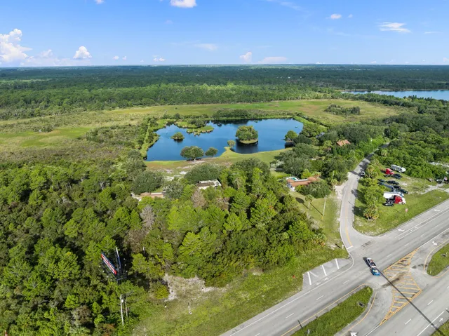 a view of a backyard of the house