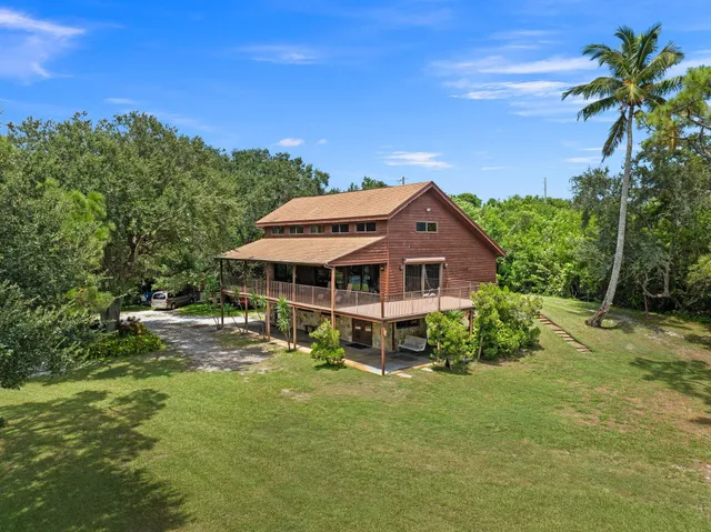 a view of a lake with a yard