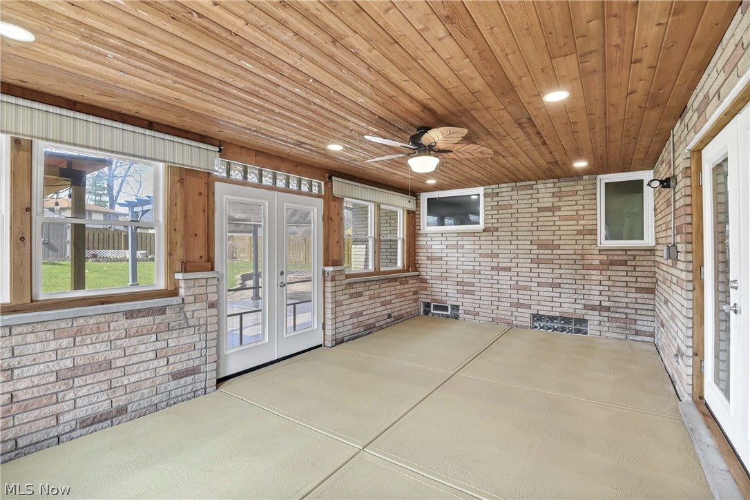 7350 Ames Road Parma, OH 44130 - Photo 15 of 50 View of the sun room windows, overhead lighting, ceiling fan / light and french doors
