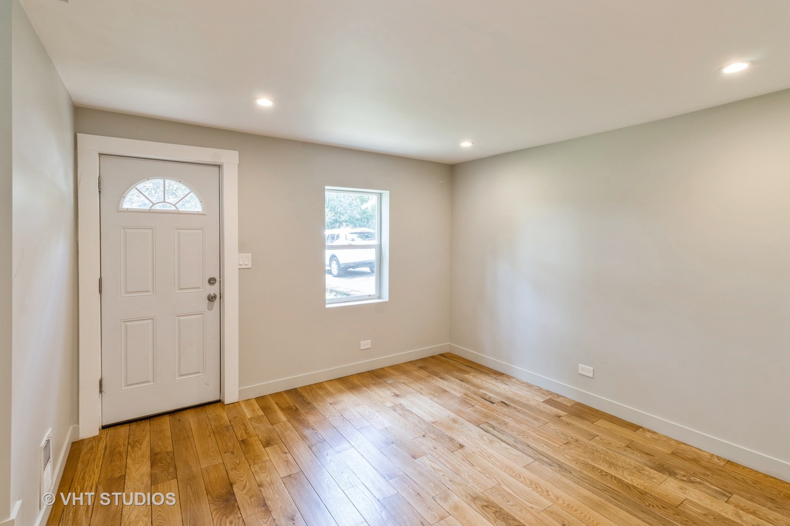 54 Deerpath Road Deer Park, IL 60010 - Photo 5 of 11 a view of empty room with wooden floor and fan