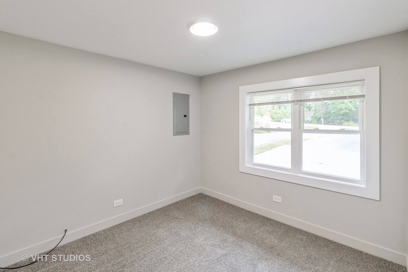 54 Deerpath Road Deer Park, IL 60010 - Photo 7 of 11 an empty room with a window