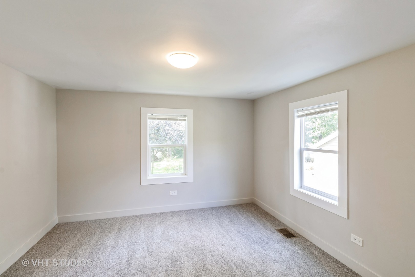 54 Deerpath Road Deer Park, IL 60010 - Photo 9 of 11 a view of an empty room with a window