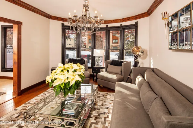 a view of livingroom with furniture and staircase