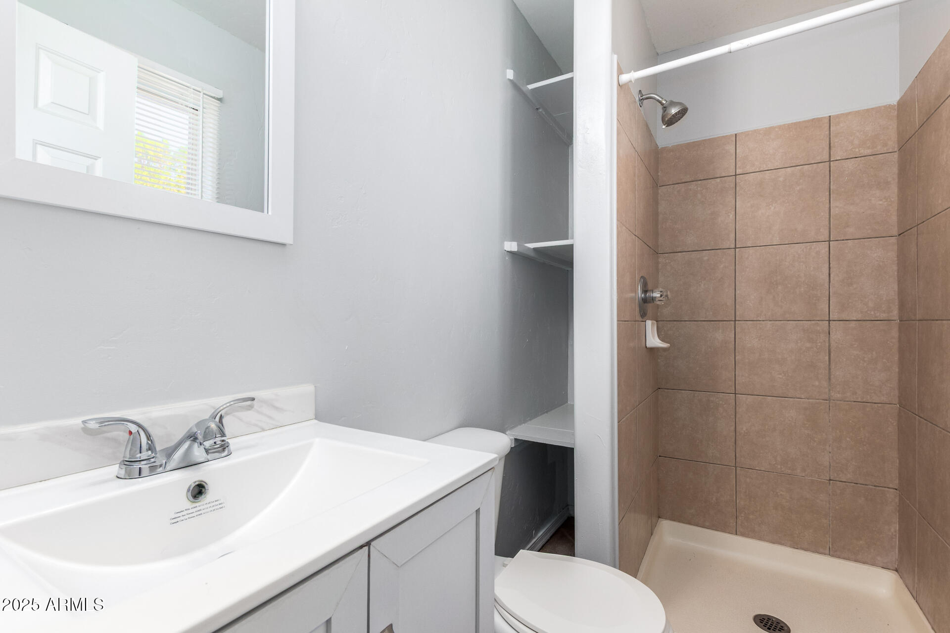 105 West 8th Street Eloy, AZ 85131 - Photo 18 of 31 a bathroom with a sink toilet and shower