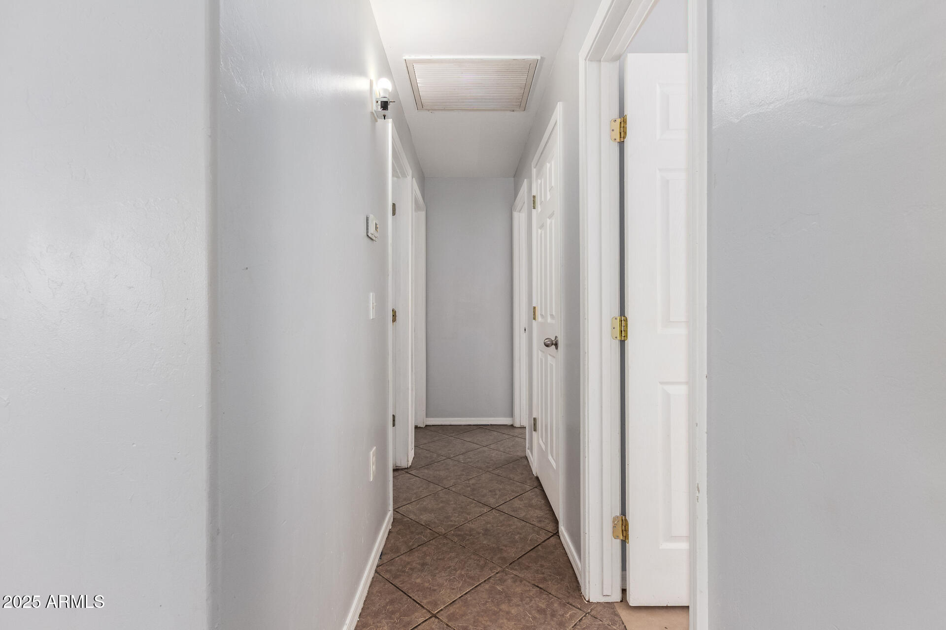 105 West 8th Street Eloy, AZ 85131 - Photo 24 of 31 a view of a hallway with a room