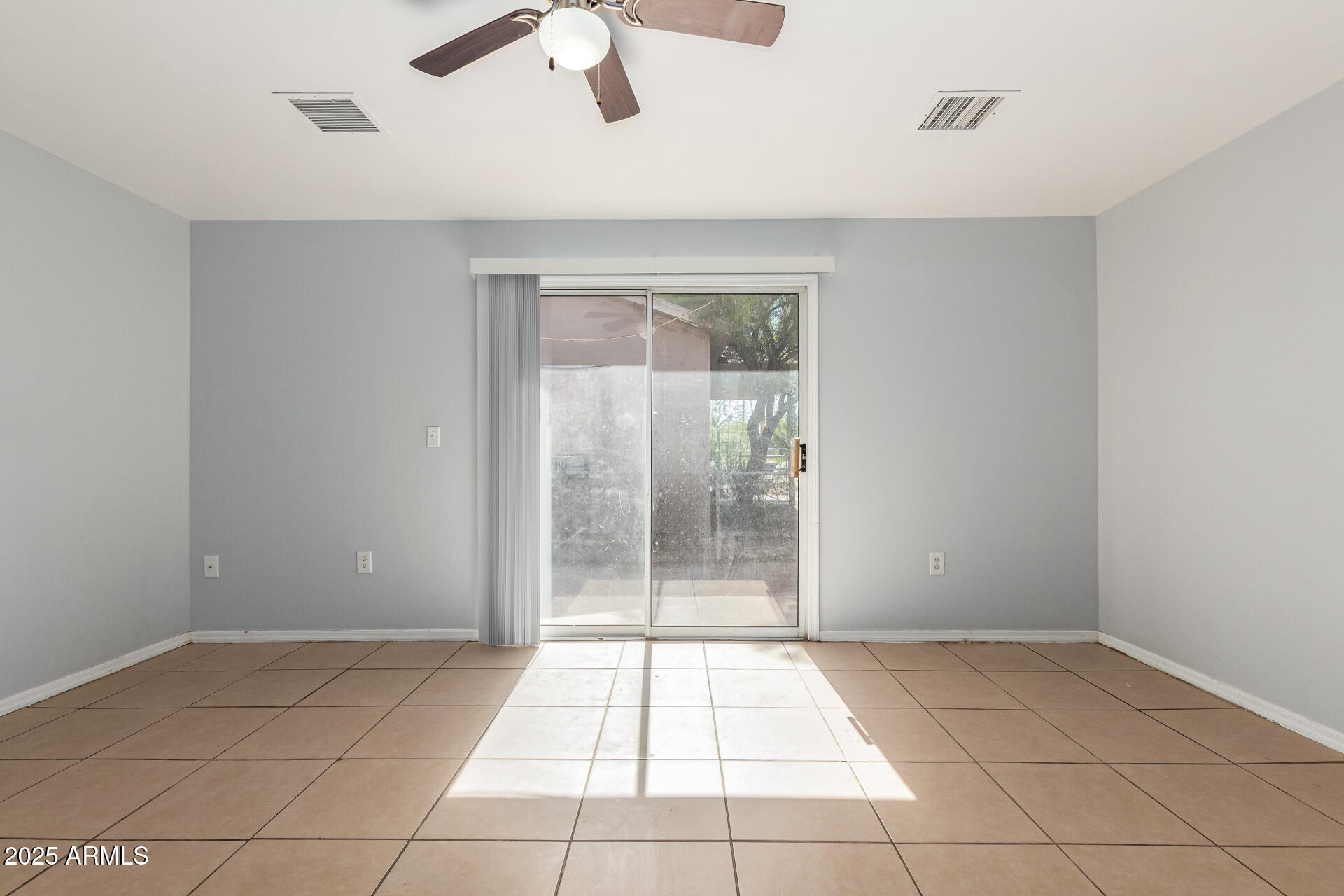 105 West 8th Street Eloy, AZ 85131 - Photo 9 of 31 a view of an empty room with a window