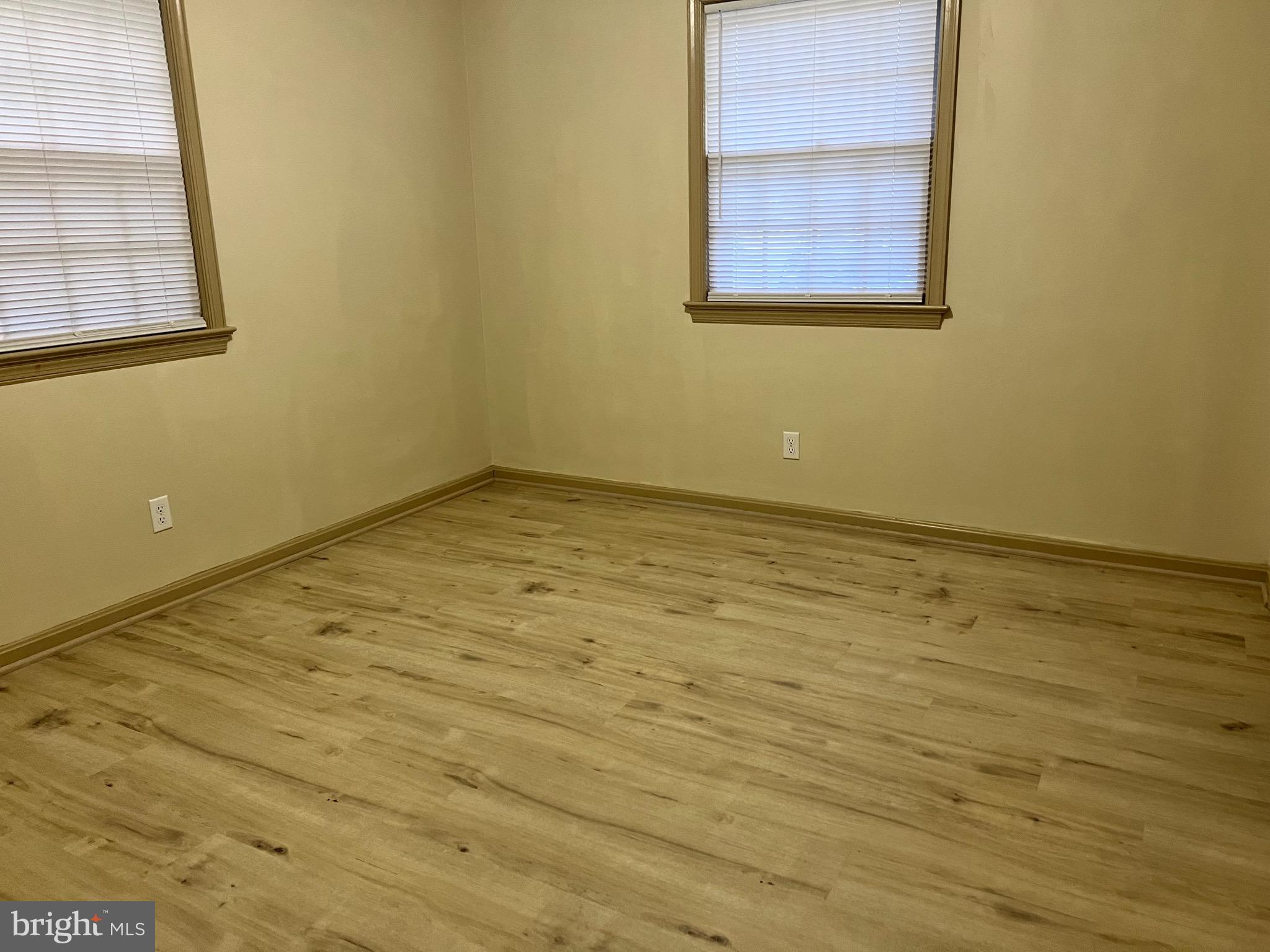 5700 Harrison Road Fredericksburg, VA 22407 - Photo 20 of 29 a view of a room with wooden floor and a window