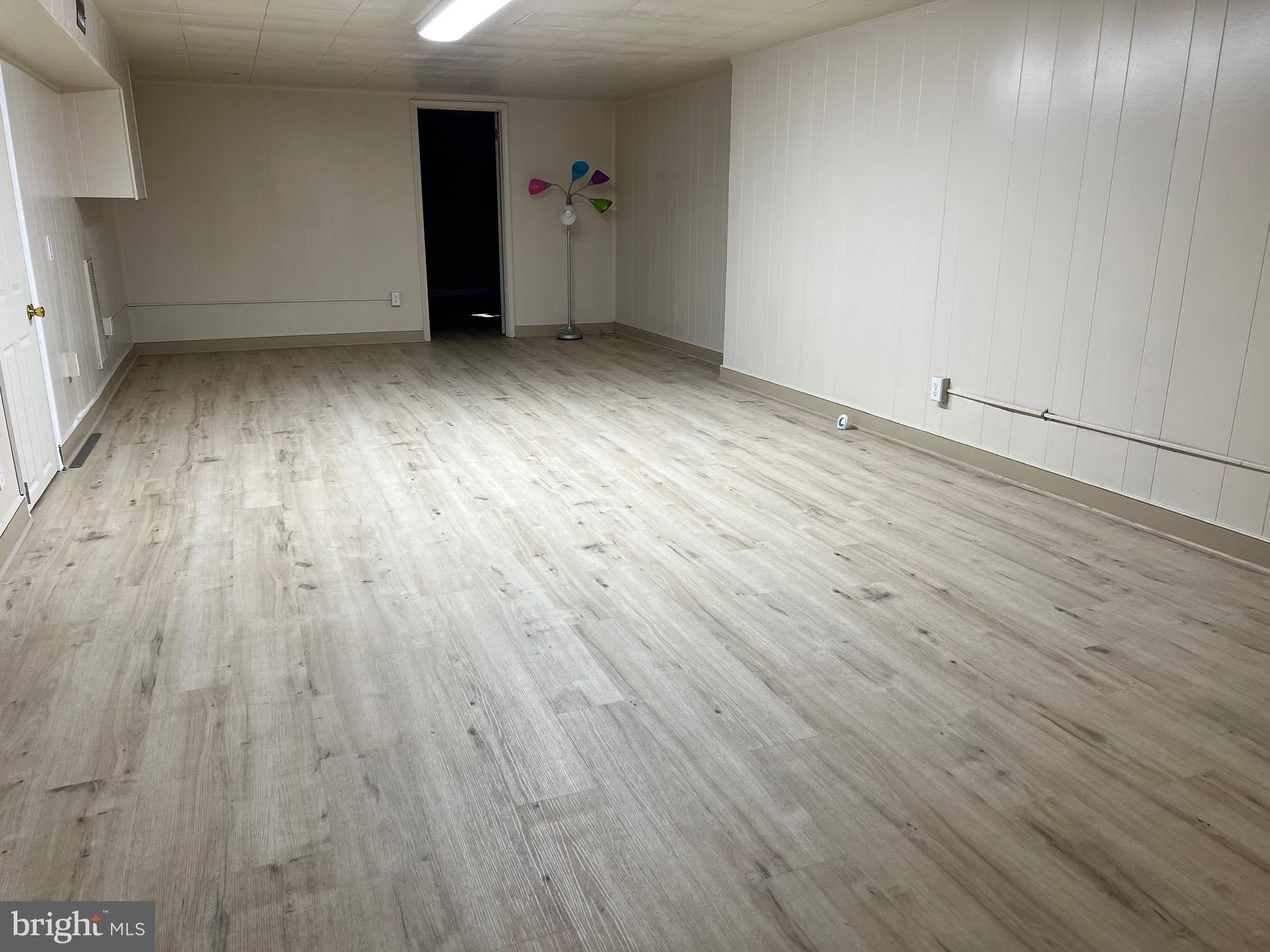 5700 Harrison Road Fredericksburg, VA 22407 - Photo 23 of 29 wooden floor in an empty room