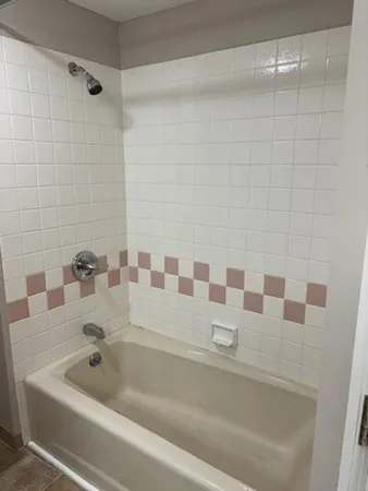 a bathroom with a bathtub