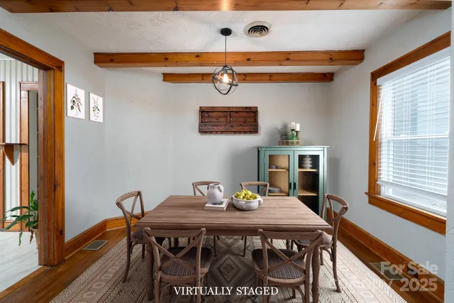 a view of a dining room with furniture