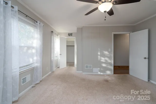 a view of an empty walk in closet