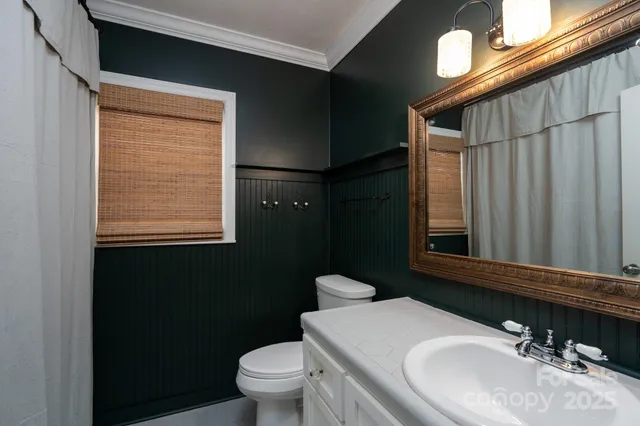 a front view of a house with garage