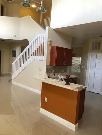 a view of a kitchen with a sink and dishwasher