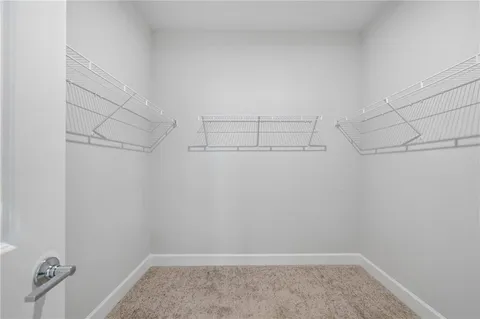 a view of a room with racks on the wall