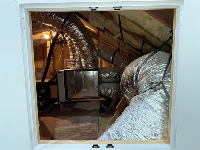 a bathroom with a sink and a microwave