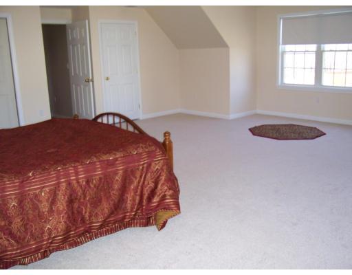 77 Hardwick Road Ashland, MA 01721 - Photo 24 of 25 a bedroom with a bed and a dresser