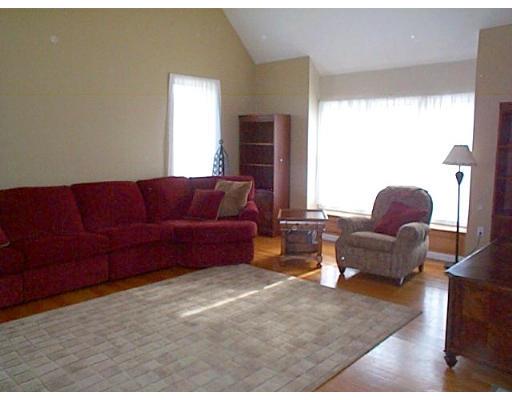 77 Hardwick Road Ashland, MA 01721 - Photo 5 of 25 a living room with furniture and a window