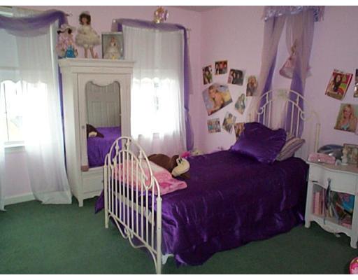 77 Hardwick Road Ashland, MA 01721 - Photo 8 of 25 a bedroom with a bed and a window