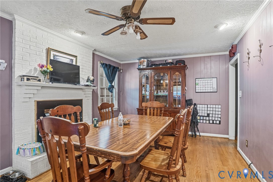 14219 Spruce Avenue Chester, VA 23836 - Photo 16 of 32 a dining room with furniture and window