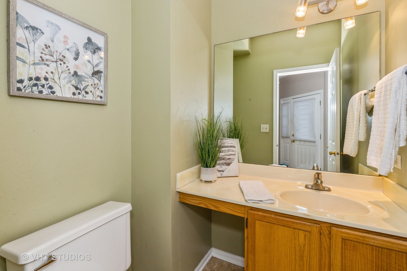 17896 Braewick Road Gurnee, IL 60031 - Photo 15 of 18 a bathroom with a granite countertop sink mirror and toilet