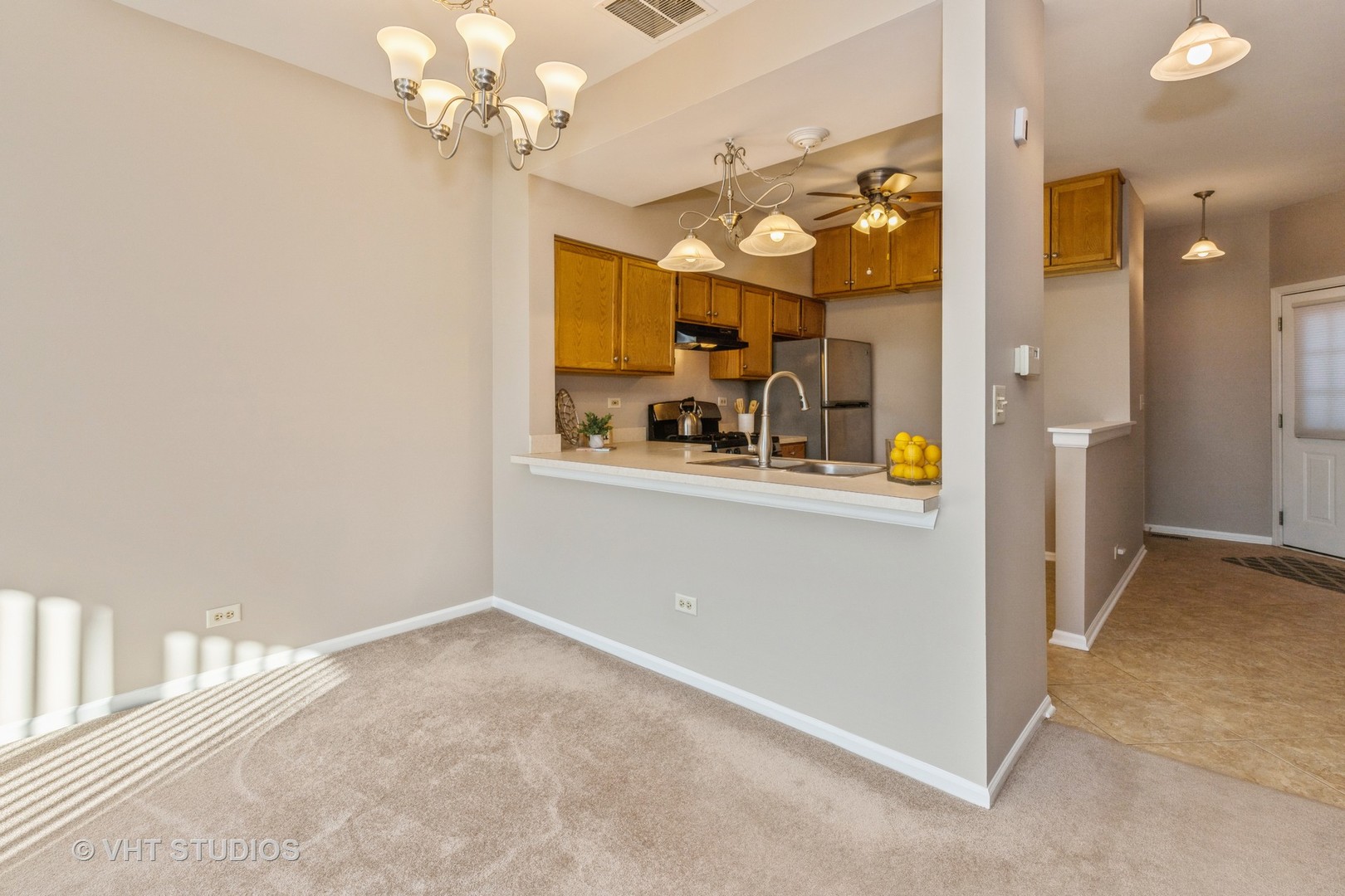 17896 Braewick Road Gurnee, IL 60031 - Photo 7 of 18 a view of a bathroom with a sink and mirror